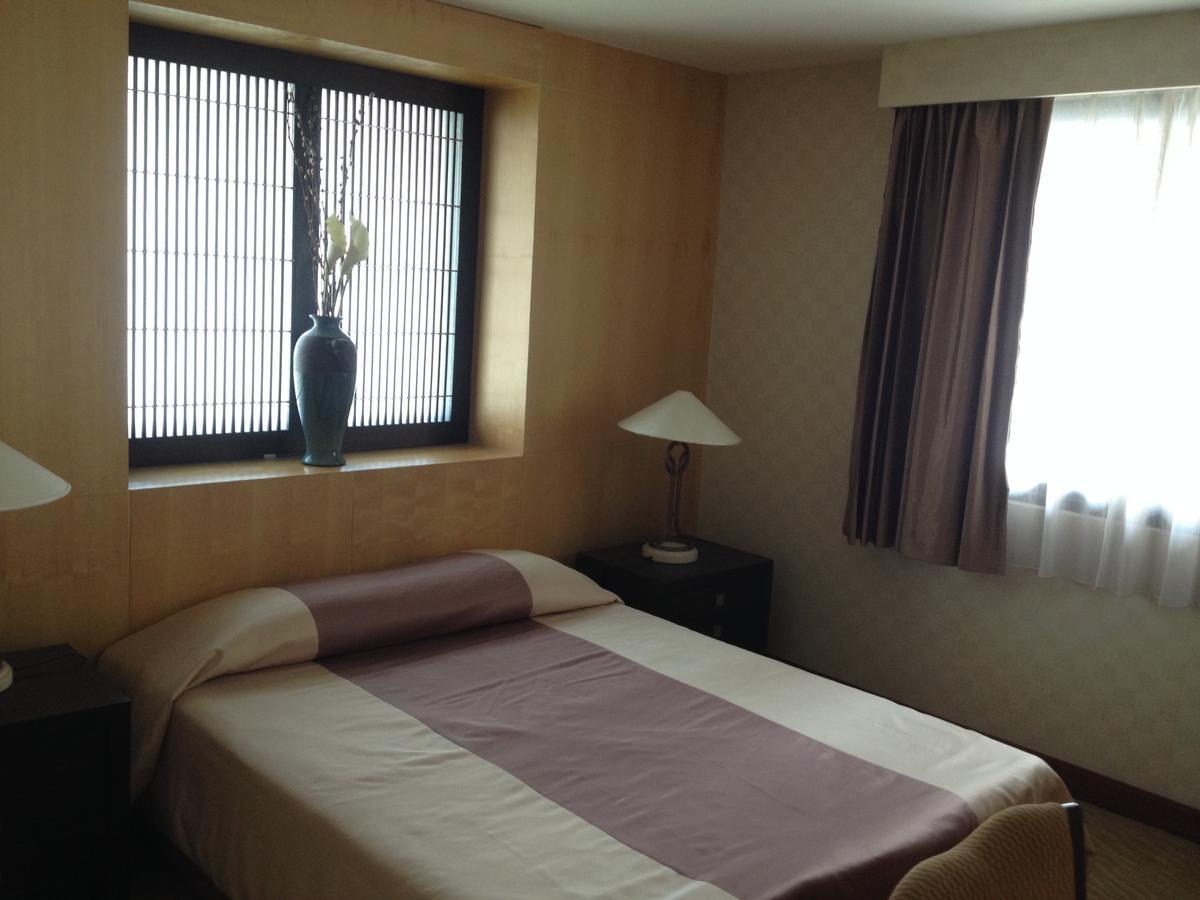 Gardengrove Suites Bangkok Pokoj fotografie